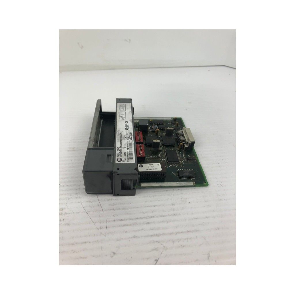 Figure 1: Front view of the Allen-Bradley 1747-DCM/A industrial automation component showing its physical design and enclosure.